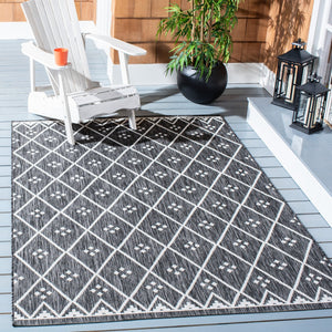 Safavieh Courtyard Elegant Geometric Pattern Area Rug For Modern Homes - Versatile Indoor/Outdoor Decor Ivory ,Black 88% Polypropylene,12% Polyester Cy8303-536-7r