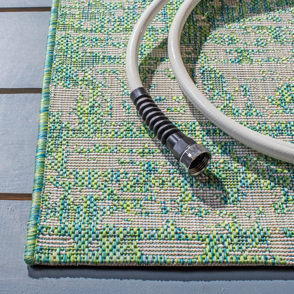 Safavieh Courtyard Luxurious Gold And Ivory Area Rug - Durable, Elegant Design For Indoor And Outdoor Use Green Blue ,Ivory 85.4% Polypropylene,10.4% Polyester,4.2% Latex Cy8452-55721-3