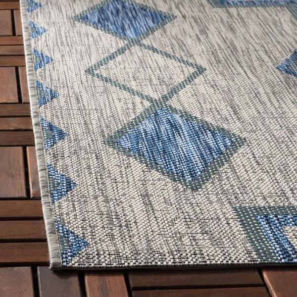 Safavieh Coutyard Stylish Indoor/Outdoor Area Rug In Chic Grey And Aqua With Dynamic Geometric Pattern Navy ,Aqua 88% Polypropylene,12% Polyester Cy8533-39421-4