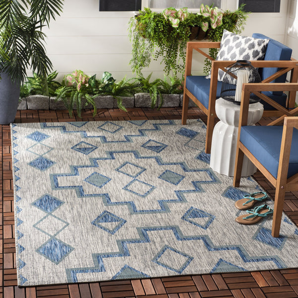 Safavieh Coutyard Stylish Indoor/Outdoor Area Rug In Chic Grey And Aqua With Dynamic Geometric Pattern Navy ,Aqua 88% Polypropylene,12% Polyester Cy8533-39421-4