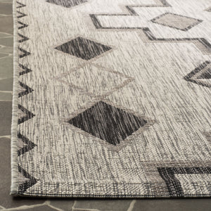 Safavieh Coutyard Stylish Indoor/Outdoor Area Rug In Chic Grey And Aqua With Dynamic Geometric Pattern Navy ,Aqua 88% Polypropylene,12% Polyester Cy8533-39421-4