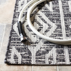 Safavieh Courtyard Santorini Geometric Area Rug – Stylish Tribal Pattern For Indoor & Outdoor Spaces Black ,Grey 85.4% Polypropylene,10.4% Polyester,4.2% Latex Cy8662-37621-28