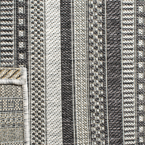 Safavieh Courtyard Contemporary Indoor/Outdoor Area Rug – Sleek Black And Grey Design, Durable & Stylish Comfort Black ,Grey 85.4% Polypropylene,10.4% Polyester,4.2% Latex Cy8784-37612-27