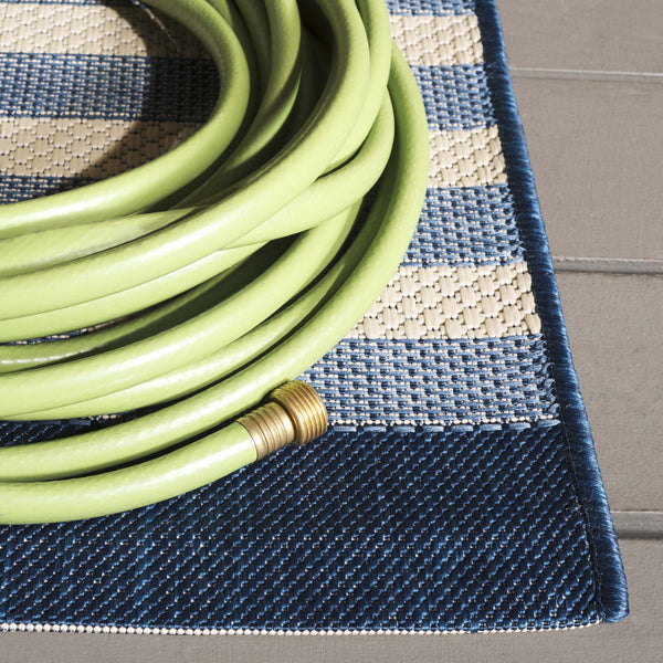 Safavieh Resort Power-loomed Area Rug With Timeless Flora Motifs For Luxurious Living Spaces And Style Navy Blue ,Beige 85.4% Polypropylene,10.4% Polyester,4.2% Latex Cys3356-25821-5