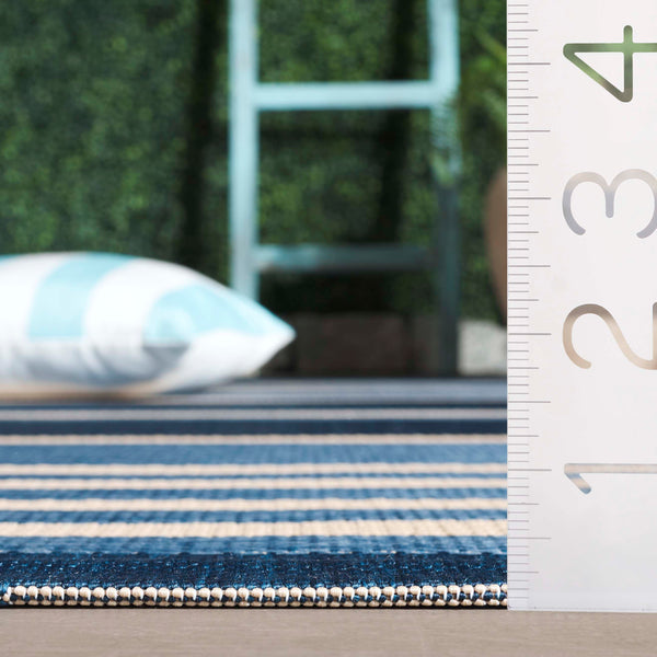 Safavieh Resort Power-loomed Area Rug With Timeless Flora Motifs For Luxurious Living Spaces And Style Navy Blue ,Beige 85.4% Polypropylene,10.4% Polyester,4.2% Latex Cys3356-25821-5