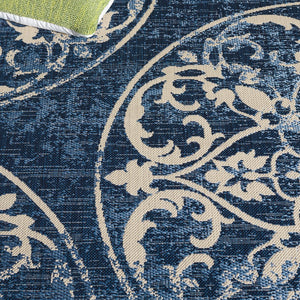 Safavieh Resort Power-loomed Area Rug With Timeless Flora Motifs For Luxurious Living Spaces And Style Navy Blue ,Beige 85.4% Polypropylene,10.4% Polyester,4.2% Latex Cys3357-25821-5