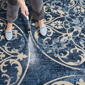 Safavieh Resort Power-loomed Area Rug With Timeless Flora Motifs For Luxurious Living Spaces And Style Navy Blue ,Beige 85.4% Polypropylene,10.4% Polyester,4.2% Latex Cys3357-25821-5