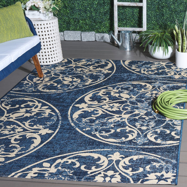 Safavieh Resort Power-loomed Area Rug With Timeless Flora Motifs For Luxurious Living Spaces And Style Navy Blue ,Beige 85.4% Polypropylene,10.4% Polyester,4.2% Latex Cys3357-25821-5