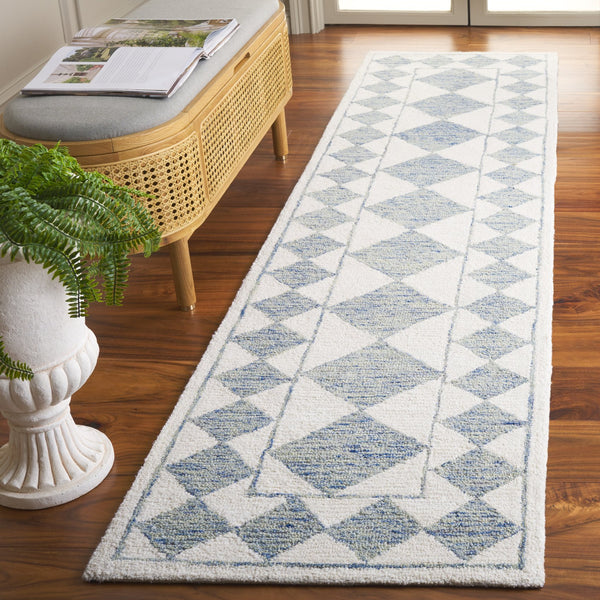 Safavieh Ebony Hand-tufted Area Rug – Luxurious Geometric Design In Soft Blue And Ivory For Modern Spaces Blue ,Ivory Wool,Polyester Ebn122m-9