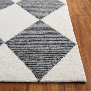 Safavieh Ebony Hand-Tufted Ivory And Black Rug — Low Profile Wool-Cotton Blend, Modern High-Contrast Elegance 5'-0" x 8'-0" EBN144A-5