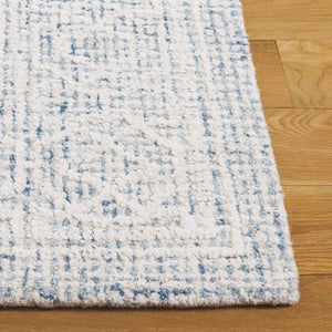 Safavieh Ebony Hand-tufted Wool Area Rug - Elegant Design With Luxurious Softness For Modern Home Decor Blue ,Ivory Indian Wool Pile Ebn277m-4