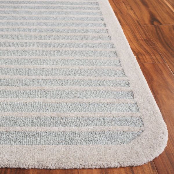 Safavieh Ebony Modern Runner Rug - Hand Tufted Wool & Cotton, Elegant Minimalist Design For Hallway Decor Light Blue ,Ivory 80% Wool,20% Cotton Ebn325m-5