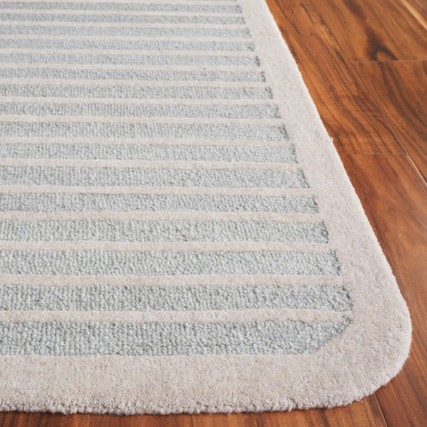 Safavieh Ebony Hand-tufted Area Rug - Luxurious Wool Blend For Elegant Living Spaces And Cozy Interiors Light Blue ,Ivory 80% Wool,20% Cotton Ebn325m-4