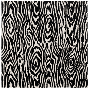 Safavieh Ebony Hand-tufted Area Rug: Luxurious Wool Blend, Modern Design, Perfect For Home Decor Elegance Black ,Ivory 80% Wool,20% Cotton Ebn550z-8