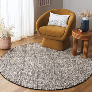 Safavieh Ebony Hand-tufted Rug - Elegant Black And Ivory Design, Luxurious Wool & Jute Blend, Modern Style Black ,Ivory 50% Wool 30% Jute 20% Cotton Ebn602z-25