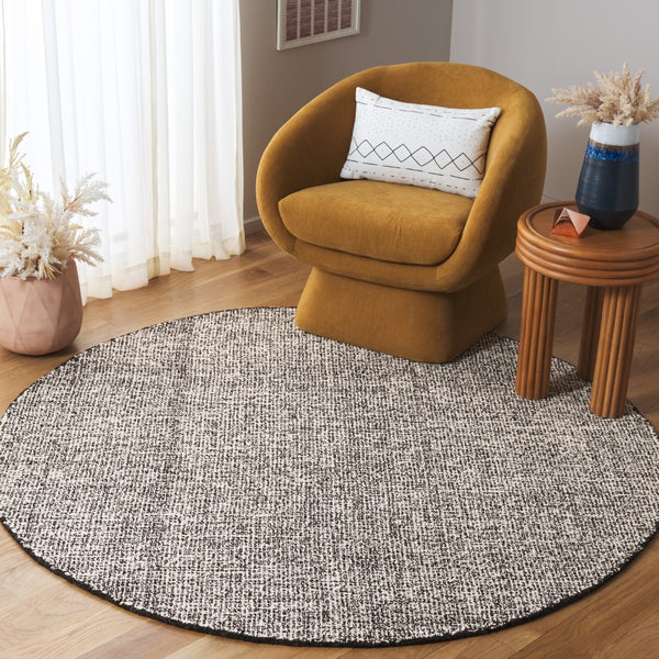 Safavieh Ebony Hand-tufted Rug - Elegant Black And Ivory Design, Luxurious Wool & Jute Blend, Modern Style Black ,Ivory 50% Wool 30% Jute 20% Cotton Ebn602z-25