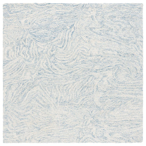 Safavieh Ebony Modern Hand Tufted Area Rug - Luxurious Wool & Cotton Blend For Stylish Contemporary Decor Ivory ,Light Blue 80% Wool,20% Cotton Ebn917l-4