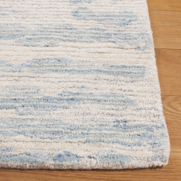 Safavieh Ebony Exquisite Hand-tufted Area Rug - Luxurious Wool-cotton Blend For Modern Home Décor Elegance Ivory ,Light Blue 80% Wool,20% Cotton Ebn919l-6sq