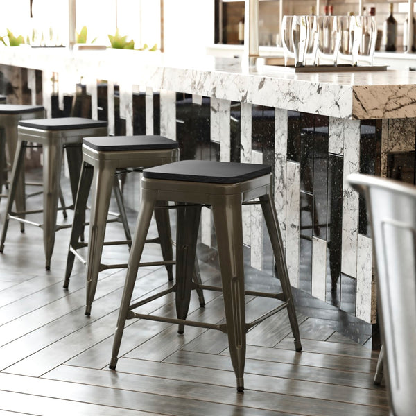 English Elm Commercial Grade Set of 4 Commercial Grade 24" High Backless Gunmetal Metal Indoor Counter Height Stools with Black All-Weather Poly Resin Seats