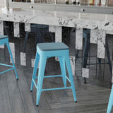 English Elm Commercial Grade Set of 4 Commercial Grade 24" High Backless Teal Metal Indoor Counter Height Stools with Teal- All-Weather Poly Resin Seats