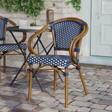 English Elm Commercial Grade Indoor/Outdoor Commercial French Bistro Stacking Chair with Arms, Navy and White PE Rattan and Bamboo Print Aluminum Frame in Natural