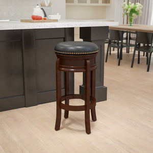 English Elm 29'' High Backless Wood Barstool with Carved Apron and LeatherSoft Swivel Seat