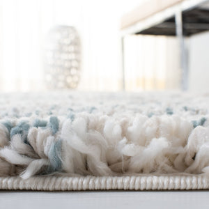 Safavieh Fontana Shag Area Rug - Elegant Modern Design, Soft Polypropylene Pile For Cozy Living Spaces Ivory ,Teal Polypropylene Pile Fnt873a-220
