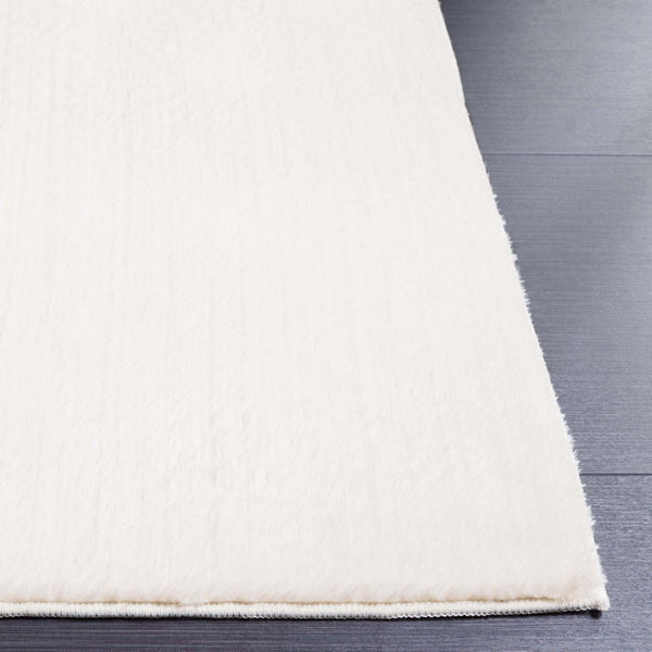 Safavieh Faux Rabbit Fur 100 Power Loomed Solid & Tonal Rug Ivory FRF100A-6R