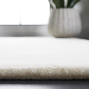 Safavieh Fifth Avenue 128 Hand Tufted Contemporary Rug Ivory FTV128A-9