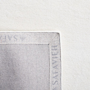 Safavieh Fifth Avenue 128 Hand Tufted Contemporary Rug Ivory FTV128A-9