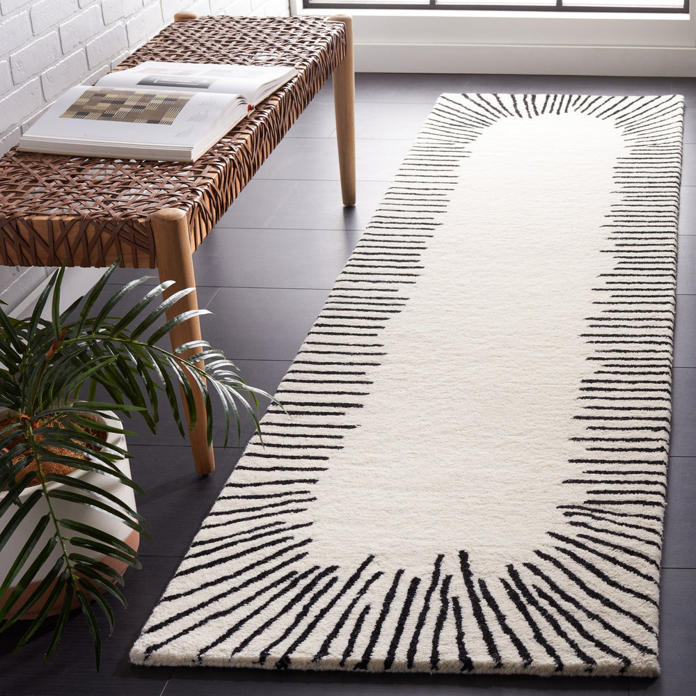 Safavieh Fifth Hand-Tufted Oval Rug In Ivory And Black Geometric Wool-Cotton Blend — Modern, Durable Style 6'-0" x 8'-0" FTV129A-68OV