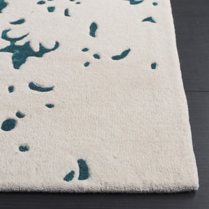 Safavieh Fifth Avenue Handcrafted Area Rug - Modern Teal And Ivory Abstract Design For Luxurious Spaces Teal ,Ivory 60% Wool,30% Viscose,10% Cotton Ftv751l-8
