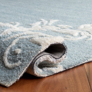 Safavieh Glamour Hand-Tufted Round Area Rug In Light Blue Ivory — Wool-Cotton Blend, Subtle Floral Elegance 6'-0" x 6'-0" GLM152M-6R