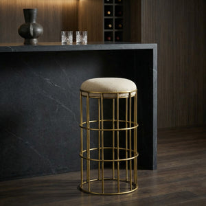 Ryley Art Deco Iron Counterstool with Brass Finish and Upholstered Linen Seat
