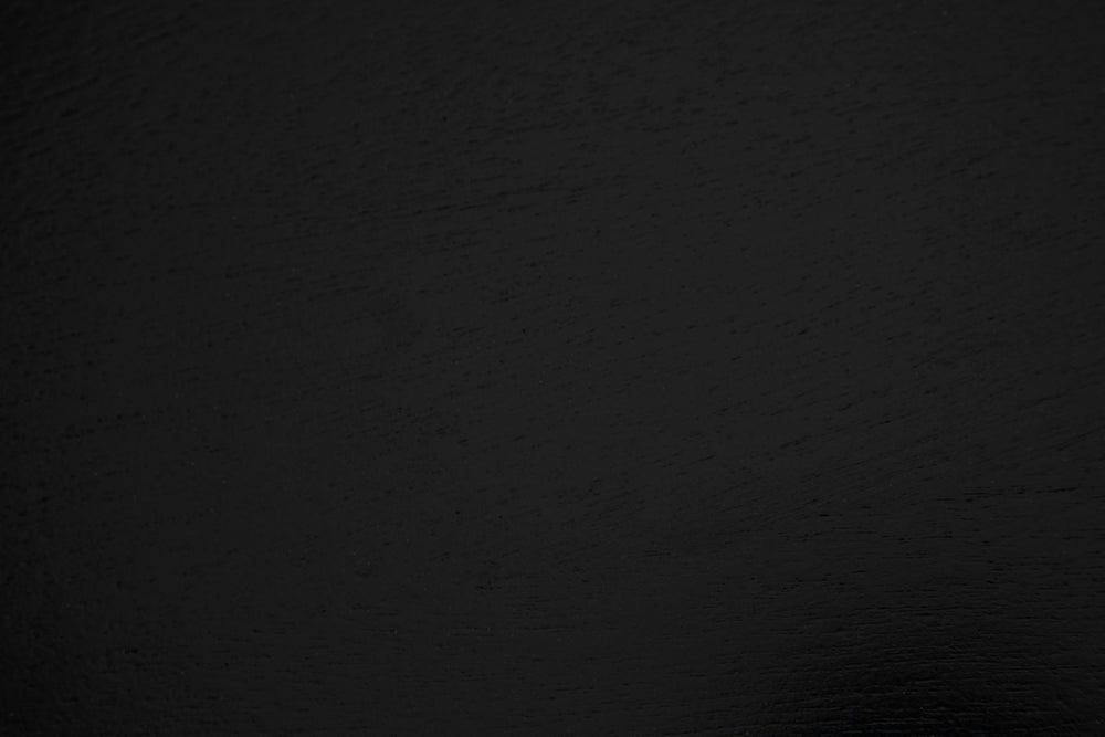 Noir Portobello Round Dining Table - Hand-Rubbed Black Finish with Golden Highlights & Ribbed Detailing GTAB560HB