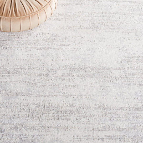 Safavieh Hanna Power Loomed Polyester Blend Area Rug Soft Ivory Tonal Accent for Modern Spaces 3'-0" x 5'-0" 45% Polypropylene, 45% Polyester, 10% Shiny Polyester HAN104A-3