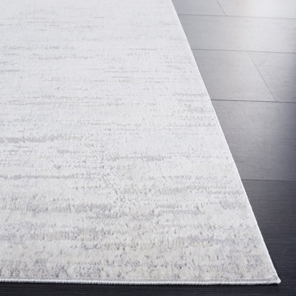 Safavieh Hanna Power Loomed Polyester Blend Area Rug Soft Ivory Tonal Accent for Modern Spaces 3'-0" x 5'-0" 45% Polypropylene, 45% Polyester, 10% Shiny Polyester HAN104A-3