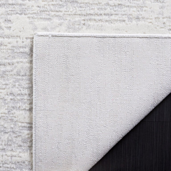 Safavieh Hanna Power Loomed Polyester Blend Area Rug Soft Ivory Tonal Accent for Modern Spaces 3'-0" x 5'-0" 45% Polypropylene, 45% Polyester, 10% Shiny Polyester HAN104A-3