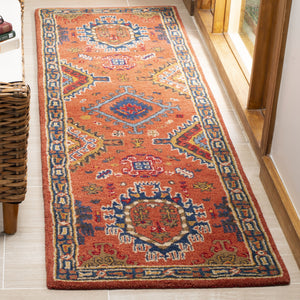 Safavieh Heritage Hand-Tufted Wool Rug In Rust With Navy Border — Timeless Medallion & Botanical Elegance 4'-0" x 6'-0" HG427P-4