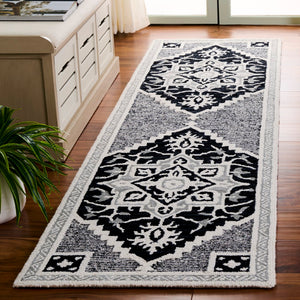 Safavieh Heritage Stylish Area Rug - Timeless Hand-tufted Design, Artisanal Craftsmanship, Versatile Elegance Black ,Ivory 80% Wool,10% Cotton,10% Latex Hg675z-4