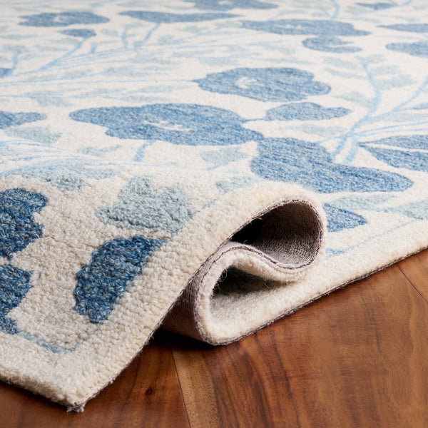 Safavieh Jardin Hand-Tufted Ivory And Blue Floral Rug, Wool-Cotton Blend For Cozy, Durable Living Spaces 8'-0" x 10'-0" JAR232M-8