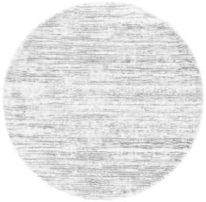 Safavieh Jasmine Shag 100 Power Loomed Shag & Flokati Rug Ivory / Grey 6'-7" x 6'-7" Round