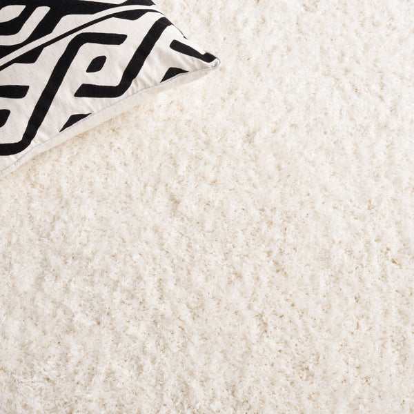 Safavieh Lindsay Shag 560 Power Loomed Shag & Flokati Rug Ivory 5'-3" x 7'-6"