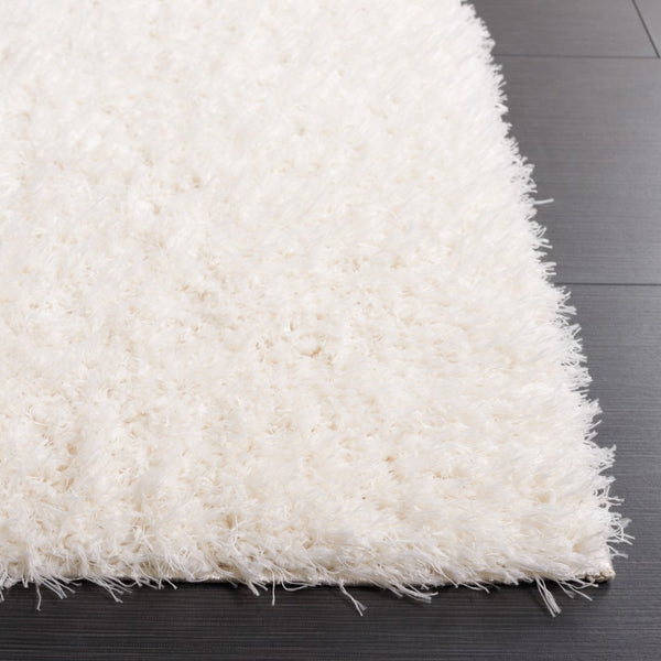 Safavieh Lindsay Shag 560 Power Loomed Shag & Flokati Rug Ivory 5'-3" x 7'-6"