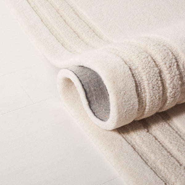 Safavieh Lrl Lachlan Hand Tufted Wool Cotton Ivory Solid Rug for Entryways and Hallways 9'-0" x 12'-0" LRL6939A-9