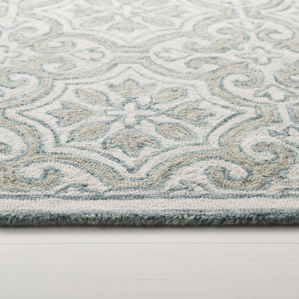 Safavieh Lrl Quinn Hand Tufted Wool Cotton Runner Rug for Hallways and Entryways Teal 4'-0" x 6'-0" LRL6944J-4