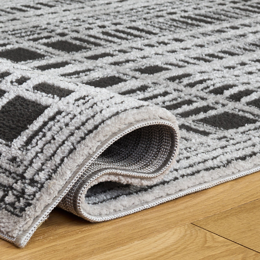 Safavieh Lunara Contemporary Black And Ivory Area Rug — Minimalist Power-Loomed Design, Durable Low-Profile Surface 5'-3" x 7'-6" LUA304Z-5