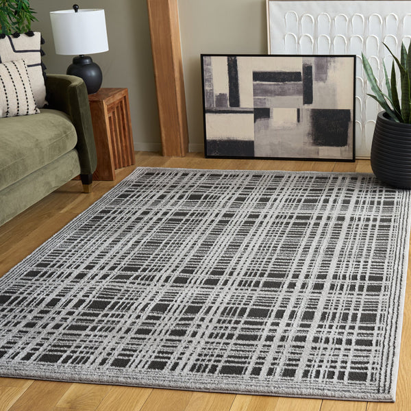 Safavieh Lunara Contemporary Black And Ivory Area Rug — Minimalist Power-Loomed Design, Durable Low-Profile Surface 5'-3" x 7'-6" LUA304Z-5
