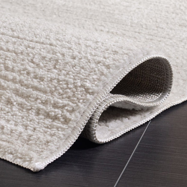 Safavieh Lunara Solid Ivory Hallway Runner Low Pile Polyester Jute Blend Turkey Woven Rug Off White 5'-3" x 7'-6" LUA336A-5