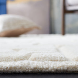 Safavieh Manhattan 575 Hand Tufted Contemporary Rug Ivory 8' x 10'